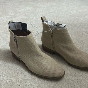 Size 11 boots for women. New with tags